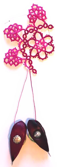 Tatting in progress with single bobbin shuttles.